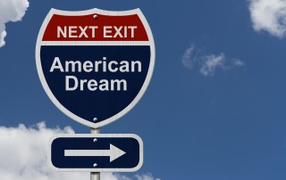 American Dream this way, Blue and Red Interstate Sign with word American Dream and an arrow with sky background